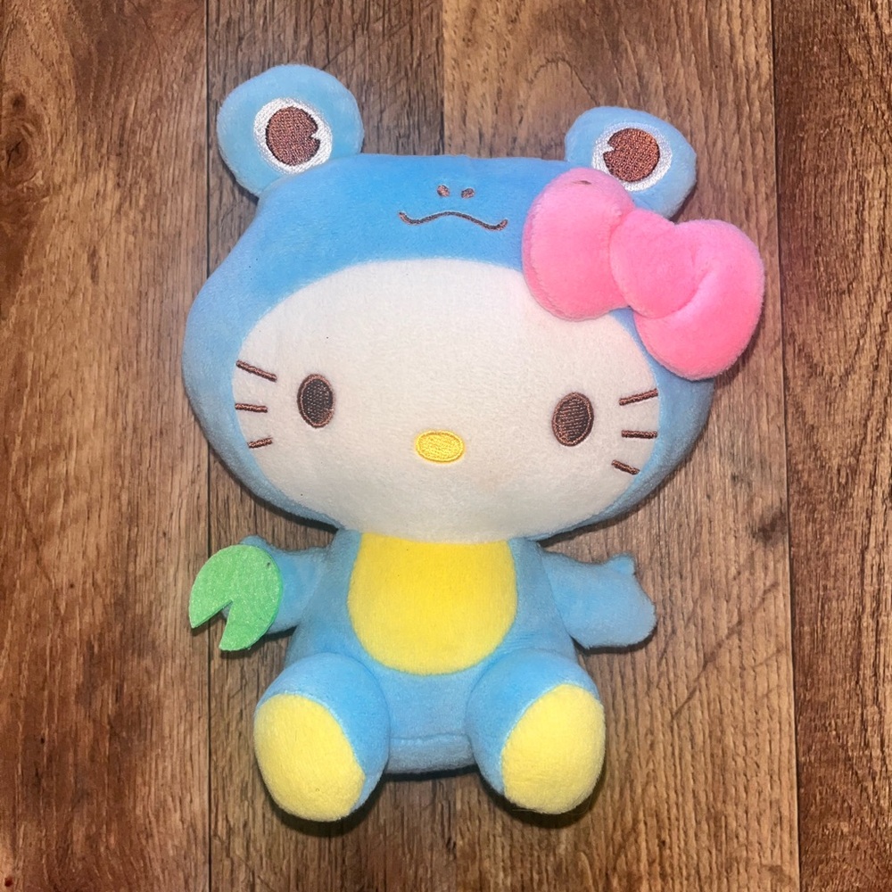 Hello Kitty Plush in Blue Frog Outfit with Pink Bow